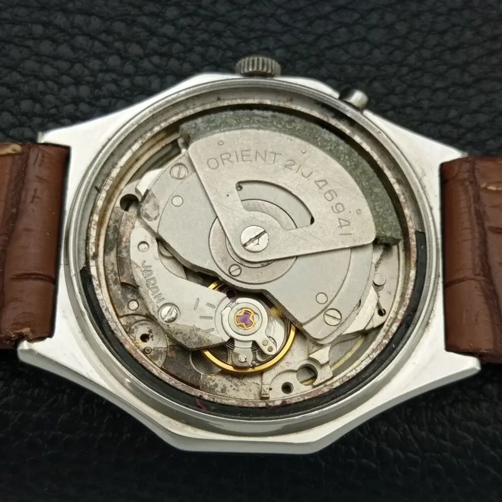 Vintage 1978 Orient Automatic Mens Silver Watch W/daydate & Gold accents